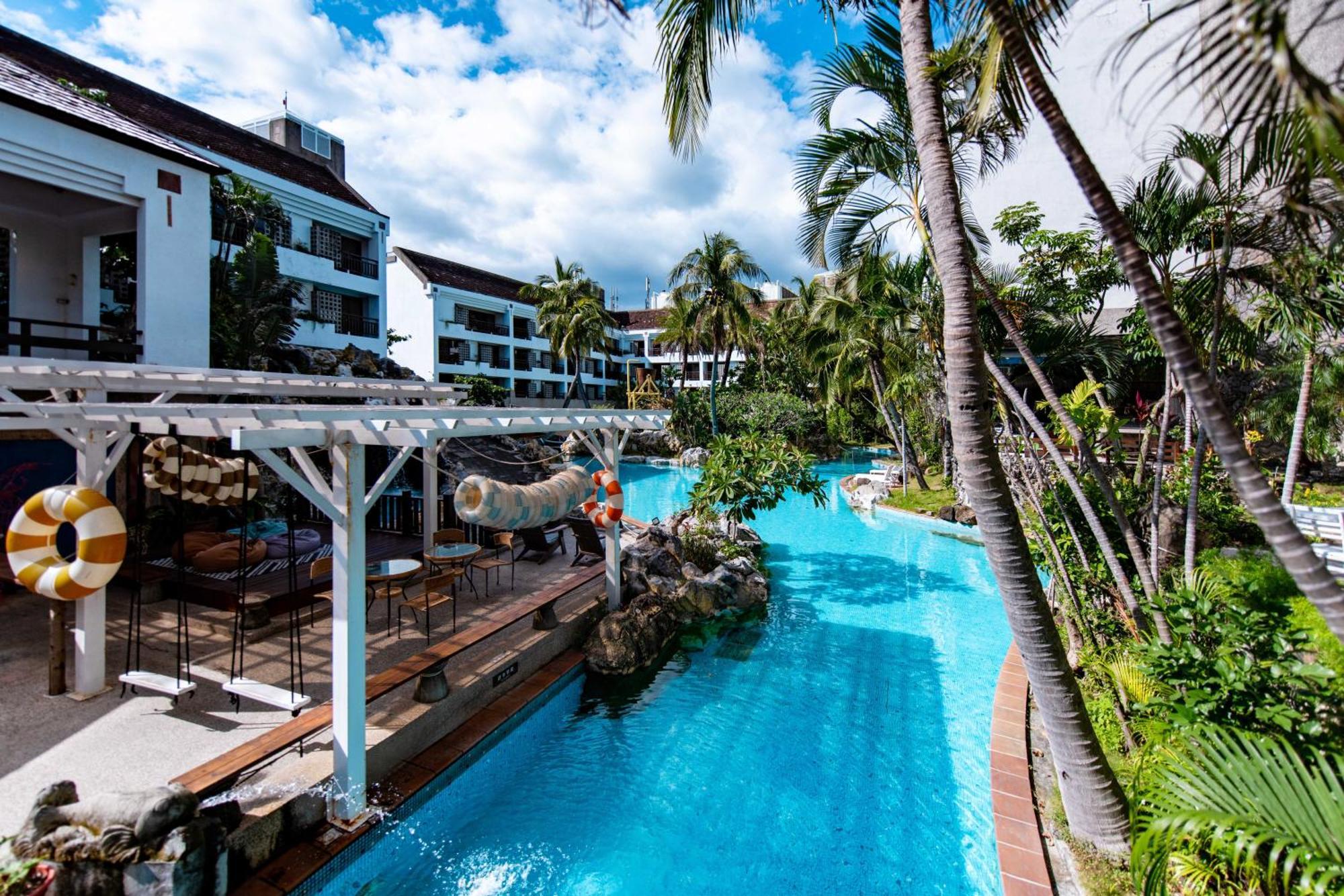 Yoho Beach Resort Kenting Heng-ch'un Exterior foto The swimming pool at the resort